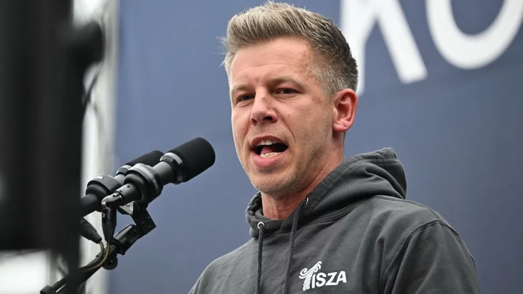 Leader of TISZA party Peter Magyar addresses activists and sympathisers of Hungary's main opposition party, the TISZA (Respect and Freedom) during a rally in Budapest on April 13, 2025. The TISZA party has concluded a two-week self-styled "referendum" on Sunday, The initiative -- dubbed "Voice of the Nation" -- is widely seen as a mobilisation exercise ahead of the election scheduled for next spring. (Photo by Attila KISBENEDEK / AFP)