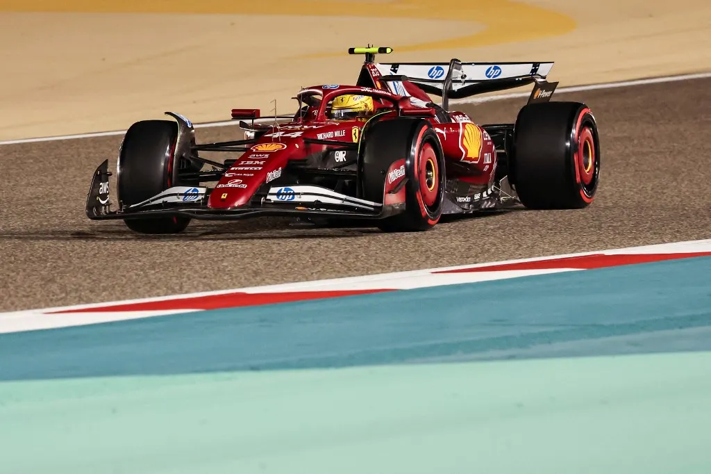 Ferrari's British driver Lewis Hamilton drives during the qualifying session ahead of the Bahrain Formula One Grand Prix at the Bahrain International Circuit in Sakhir on April 12, 2025. (Photo by Fadel SENNA / AFP)