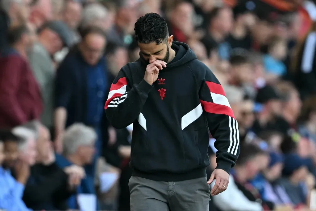 Manchester United's Portuguese head coach Ruben Amorim reacts during the English Premier League football match between Bournemouth and Manchester United at the Vitality Stadium in Bournemouth, southern England on April 27, 2025. (Photo by Glyn KIRK / AFP) / RESTRICTED TO EDITORIAL USE. No use with unauthorized audio, video, data, fixture lists, club/league logos or 'live' services. Online in-match use limited to 120 images. An additional 40 images may be used in extra time. No video emulation. Social media in-match use limited to 120 images. An additional 40 images may be used in extra time. No use in betting publications, games or single club/league/player publications. / 