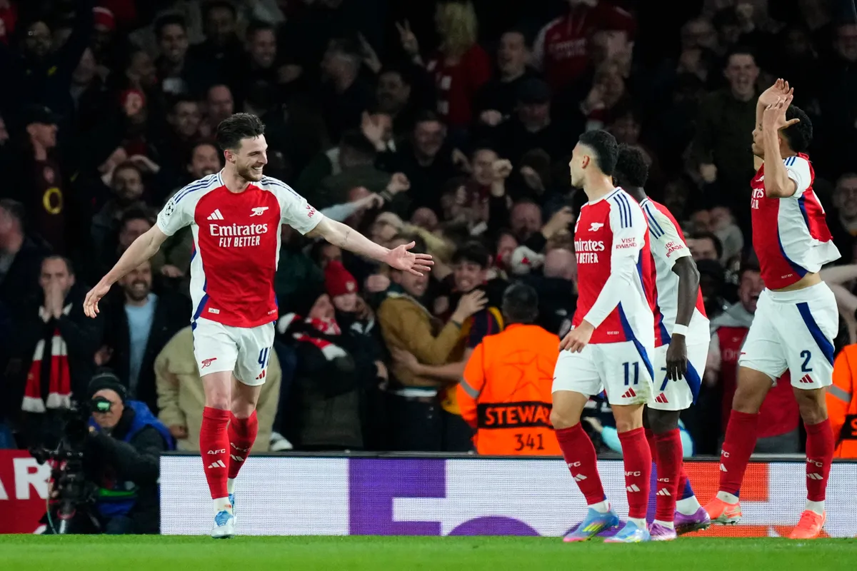 Declan Rice central midfield of Arsenal and England celebrates after scoring his sides second goal during the UEFA Champions League 2024/25 Quarter Final First Leg match between Arsenal FC and Real Madrid C.F. at Arsenal Stadium on April 8, 2025 in London, England.  (Photo by Jose Breton/Pics Action/NurPhoto) (Photo by Jose Breton / NurPhoto / NurPhoto via AFP)