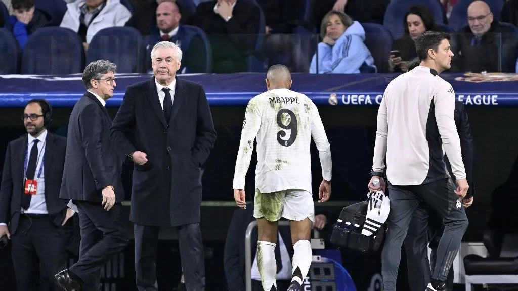 MADRID, SPAIN - APRIL 16: Kylian Mbappe (9) of Real Madrid gets injured during the UEFA Champions League quarter-final second-leg match between Real Madrid and Arsenal at Santiago Bernabeu Stadium in Madrid, Spain on April 16, 2025. Burak Akbulut / Anadolu (Photo by BURAK AKBULUT / ANADOLU / Anadolu via AFP)