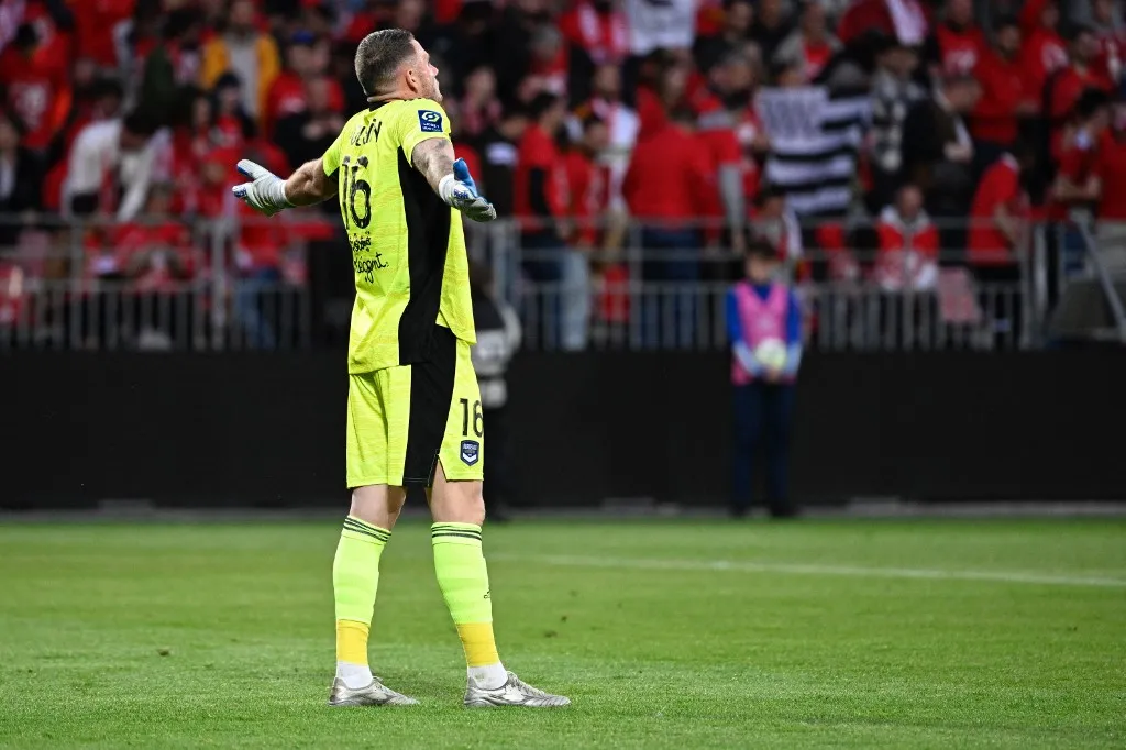 Bordeauxs French goalkeeper Gaetan Poussin reacts after conceding a goal during the French L1 football match between Stade Brestois 29 (Brest) and Girondins de Bordeaux at Stade Francis-Le Ble in Brest, western France on May 21, 2022. (Photo by DAMIEN MEYER / AFP)