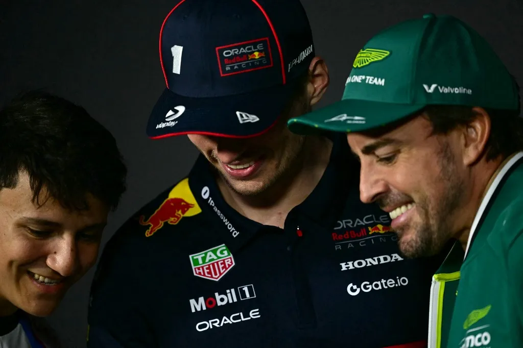 RB's French-Algerian driver Isack Hadjar (L), Red Bull Racing's Dutch driver Max Verstappen (C) and Aston Martin's Spanish driver Fernando Alonso attend a press conference ahead of the 2023 Saudi Arabia Formula One Grand Prix at the Jeddah Corniche Circuit on April 17, 2025. (Photo by Giuseppe CACACE / AFP)
