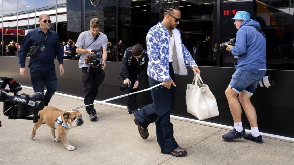 SILVERSTONE - Lewis Hamilton (Mercedes) and his dog Roscoe arrive at the Silverstone race circuit in the run-up to the British Grand Prix. ANP SANDER KONING netherlands out - belgium out (Photo by Sander KONING / ANP MAG / ANP via AFP)