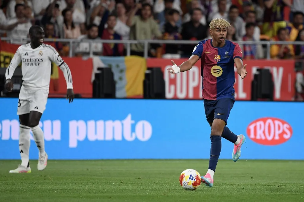 Barcelona's Spanish forward #19 Lamine Yamal reacts during the Spanish Cup, Copa del Rey (King's Cup) final football match between FC Barcelona and Real Madrid CF at La Cartuja stadium in Seville on April 26, 2025. (Photo by Josep LAGO / AFP)