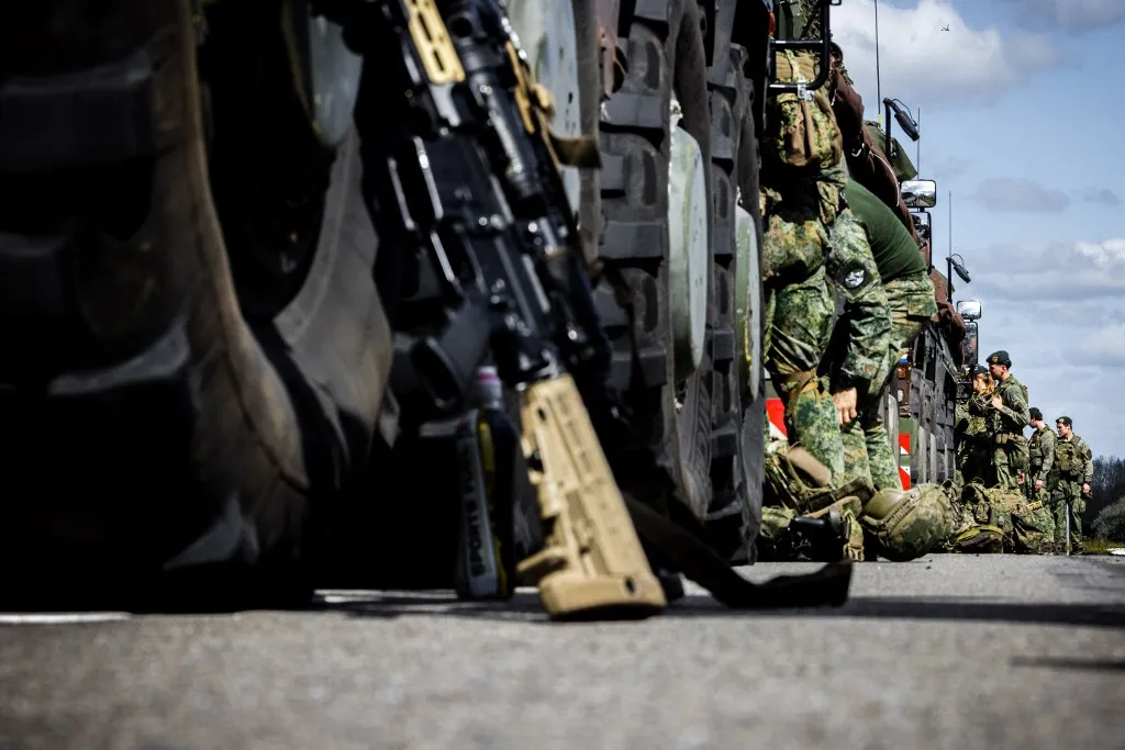 OIRSCHOT - Military personnel prepare vehicles for the army exercise Bastion Lion. During the exercise, the Royal Army is preparing for a large-scale conflict, involving a German and two Dutch combat battalions. ANP ROB ENGELAAR netherlands out - belgium out (Photo by ROB ENGELAAR / ANP MAG / ANP via AFP)