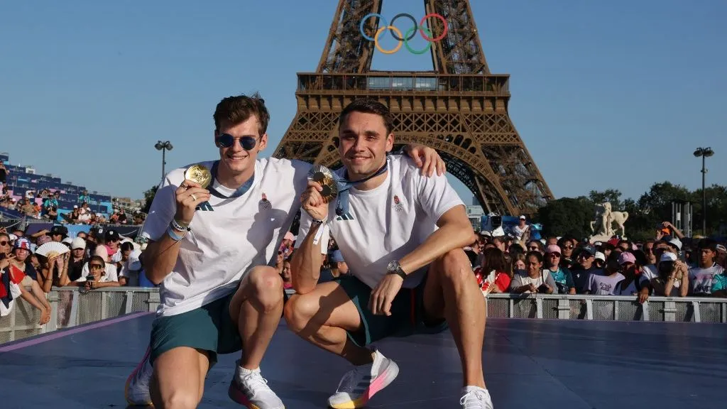 Gold medallist in the men's 200m backstroke swimming event Hungary's Hubert Kós and gold medallist in the men's 100m butterfly swimming event and silver medallist in the men's 200m butterfly swimming Hungary's Kritof Milák pose at the Champions Park at Trocadero during the Paris 2024 Olympic Games in Paris on August 5, 2024. (Photo by Jack GUEZ / AFP)