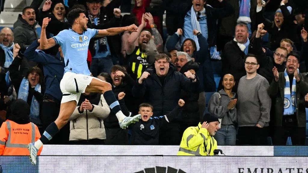 Manchester City's Portuguese midfielder #27 Matheus Nunes celebrates after scoring his team second goal during the English Premier League football match between Manchester City and Aston Villa at the Etihad Stadium in Manchester, north west England, on April 22, 2025. (Photo by Oli SCARFF / AFP) / RESTRICTED TO EDITORIAL USE. No use with unauthorized audio, video, data, fixture lists, club/league logos or 'live' services. Online in-match use limited to 120 images. An additional 40 images may be used in extra time. No video emulation. Social media in-match use limited to 120 images. An additional 40 images may be used in extra time. No use in betting publications, games or single club/league/player publications. / 