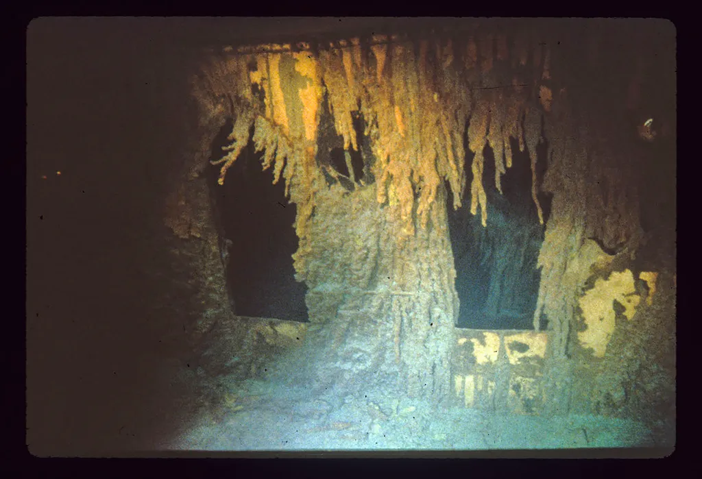 This handout image taken during the historical 1986 dive, courtesy of WHOI (Woods Hole Oceanographic Institution) and released February 15, 2023 shows the exterior of the Titanic, showing "rusticles" that have formed since the ship came to rest on the sea
