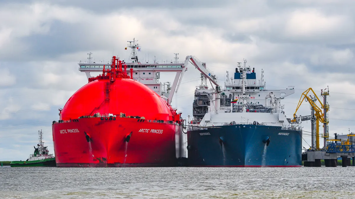 Klaipeda,Lithuania-July 20,2015: LNG import terminal FSRU Independence and LNG Tanker ARCTIC PRINCESS in port.