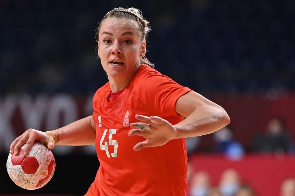 Hungary's left back Noemi Hafra prepares to shoot during the women's quarterfinal handball match between Norway and Hungary of the Tokyo 2020 Olympic Games at the Yoyogi National Stadium in Tokyo on August 4, 2021. (Photo by Fabrice COFFRINI / AFP)