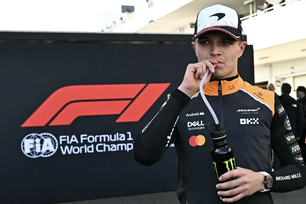 McLaren's British driver Lando Norris walks in the paddock after the second practice session of the Formula One Japanese Grand Prix at the Suzuka circuit in Suzuka, Mie prefecture on April 4, 2025. (Photo by MOHD RASFAN / AFP)