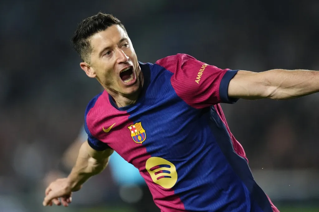 Robert Lewandowski centre-forward of Barcelona and Poland celebrates after scoring his sides second goal during the UEFA Champions League 2024/25 Quarter Final First Leg match between FC Barcelona and Borussia Dortmund at Estadi Olimpic Lluis Companys on April 9, 2025 in Barcelona, Spain. (Photo by Jose Breton/Pics Action/NurPhoto) (Photo by Jose Breton / NurPhoto / NurPhoto via AFP)