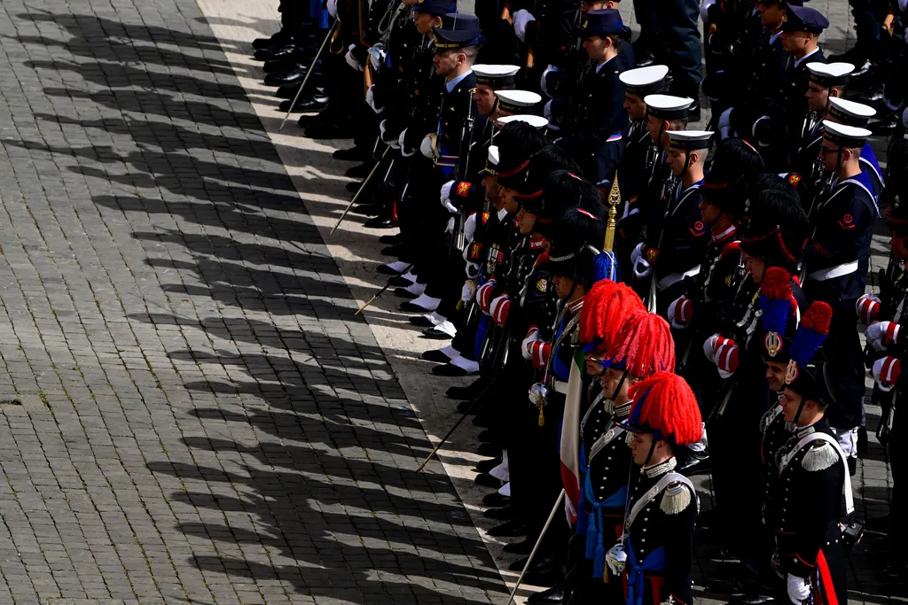 A guard of honor stands on the parvis of the basilica during the Easter Mass as part of the Holy Week celebrations, at St Peter's square in the Vatican on April 20, 2025. (Photo by Tiziana FABI / AFP)