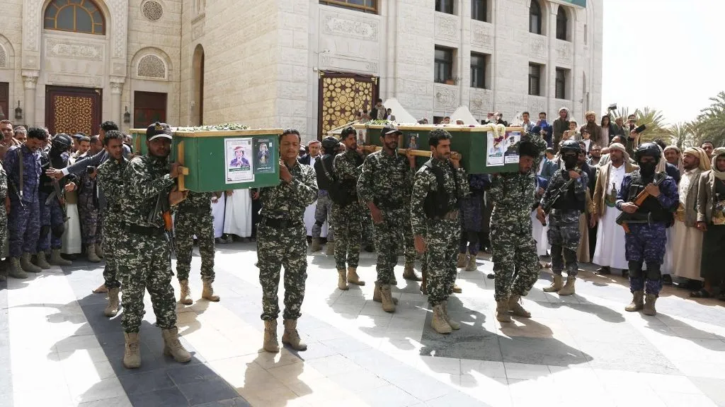 SANAA, YEMEN - APRIL 17: Citizens and soldiers attend the funeral ceremony held for those who died in the attack by US warplanes on a house belonging to the Sheikh Al-Suhaili family in the Sawan district of the capital Sanaa at Al Sha'ab Mosque in Sanaa, Yemen on April 17, 2025. Mohammed Hamoud / Anadolu (Photo by Mohammed Hamoud / ANADOLU / Anadolu via AFP)