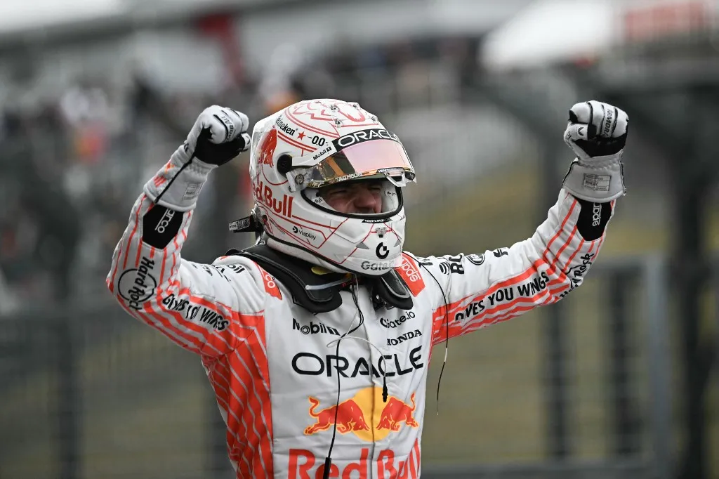 Red Bull Racing's Dutch driver Max Verstappen celebrates winning the Formula One Japanese Grand Prix at the Suzuka circuit in Suzuka, Mie prefecture, Japan on April 6, 2025. (Photo by Philip FONG / AFP)