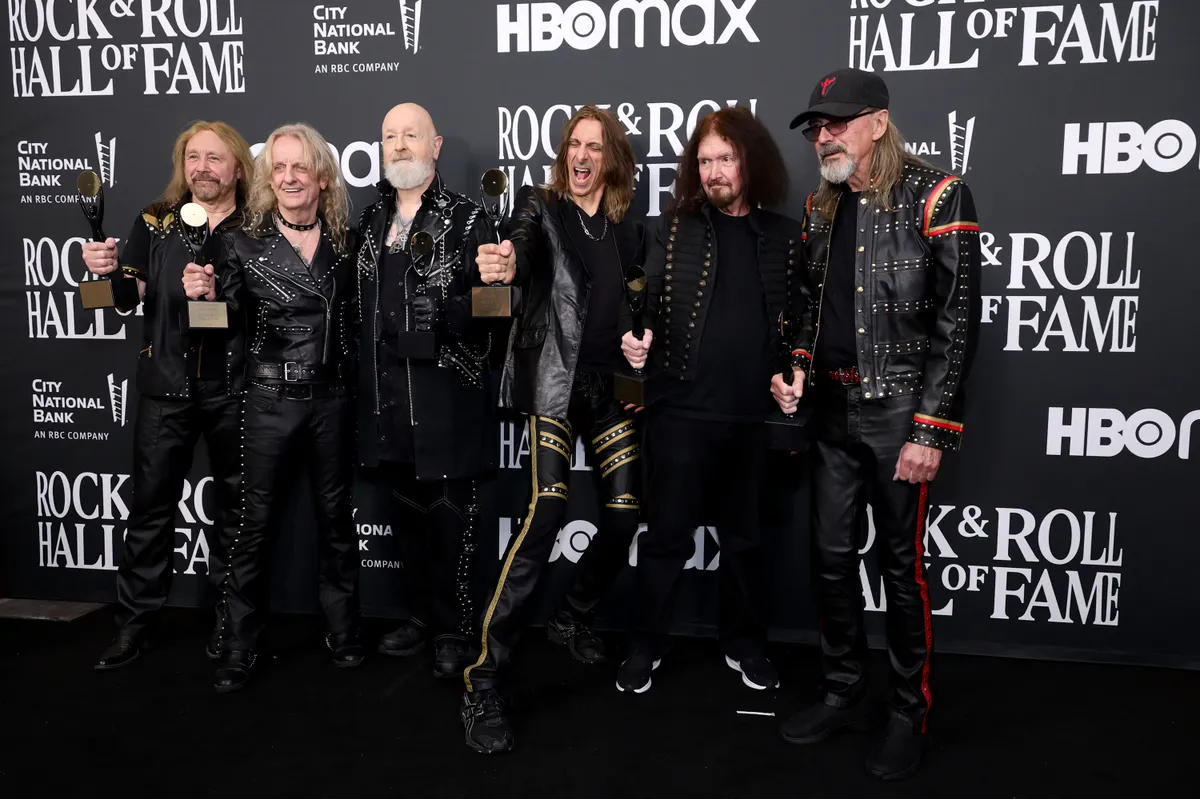 LOS ANGELES, CALIFORNIA - NOVEMBER 05: (L-R) Inductees Ian Hill, K. K. Downing, Rob Halford, Scott Travis, Les Binks and Glenn Tipton of Judas Priest pose in the press room during the 37th Annual Rock & Roll Hall of Fame Induction Ceremony at Microsoft Theater on November 05, 2022 in Los Angeles, California.   Emma McIntyre/Getty Images for The Rock and Roll Hall of Fame/AFP (Photo by Emma McIntyre / GETTY IMAGES NORTH AMERICA / Getty Images via AFP)