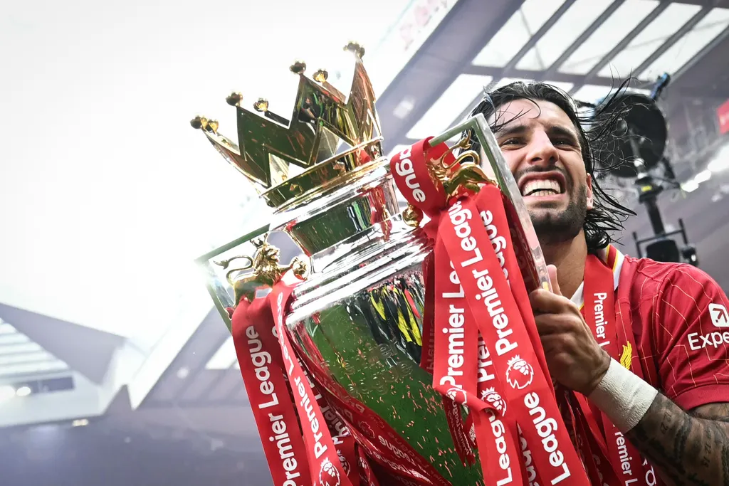 Szoboszlai, Liverpool's Hungarian midfielder #08 Dominik Szoboszlai celebrates with the Premier League trophy at the end of the English Premier League football match between Liverpool and Crystal Palace at Anfield in Liverpool, north west England on May 2