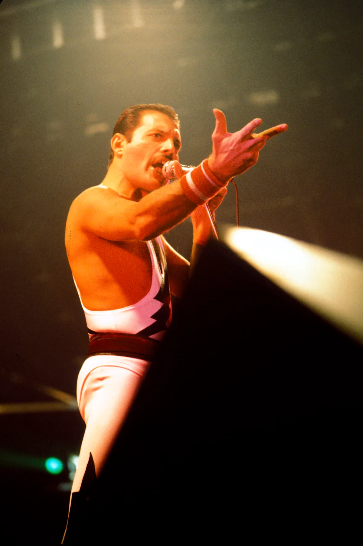 Freddie Mercury (1946-1991), British singer-songwriter and member of the band Queen, during a concert at the Palazzo dell'Esporto in Milan (Italy), June 14, 1984. (Photo by Christian Rose / Christian Rose / Roger-Viollet via AFP)
