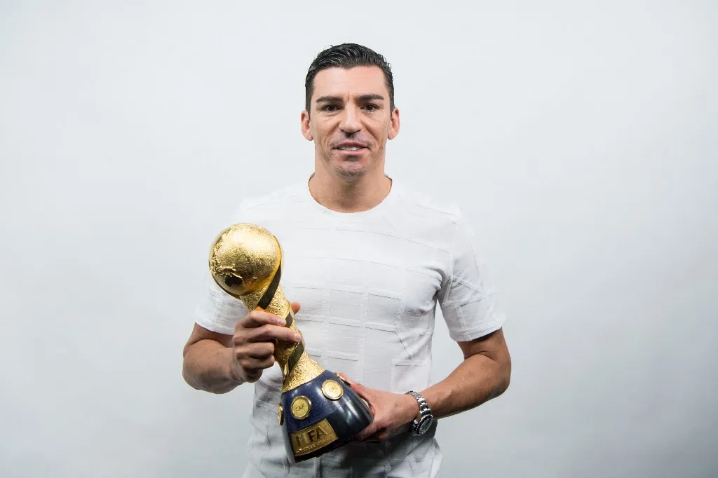 megégett The Brasilian soccer player Lucio holds the winner's trophy of the Confed Cup after an interview in Berlin, Germany, 25 May 2017. Photo: Sebastian Gollnow/dpa (Photo by Sebastian Gollnow / DPA / dpa Picture-Alliance via AFP)