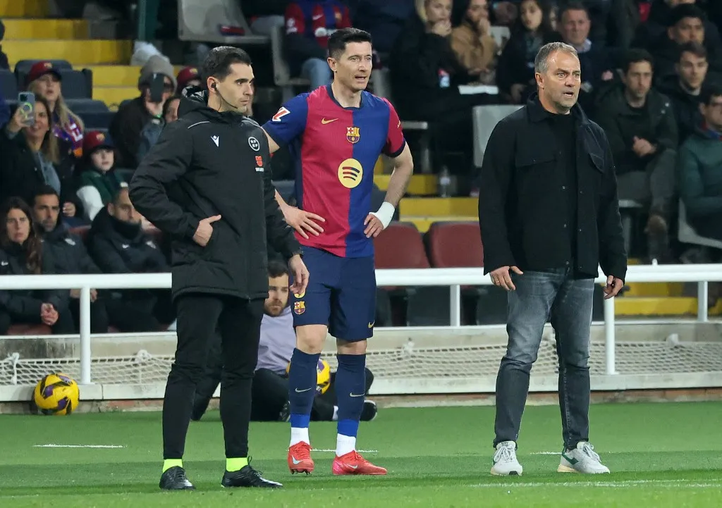 Robert Lewandowski and Hansi Flick are present during the match between FC Barcelona and Club Atletico Osasuna, corresponding to week 27 of LaLiga EA Sports, at the Lluis Companys Stadium in Barcelona, Spain, on March 27, 2025. (Photo by Joan Valls/Urbanandsport/NurPhoto) (Photo by Urbanandsport / NurPhoto / NurPhoto via AFP)