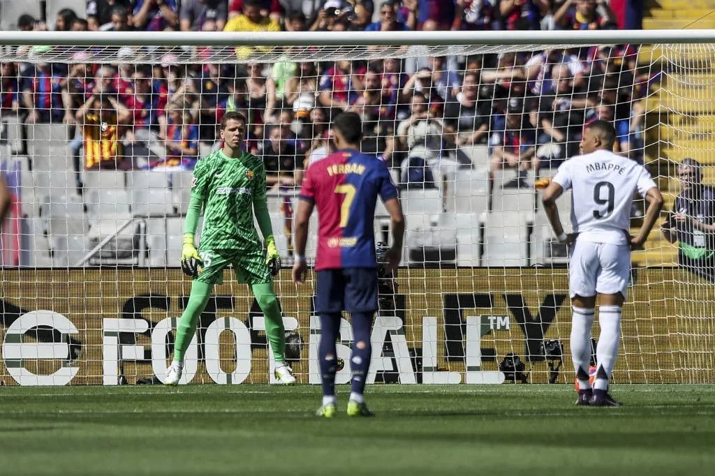 Wojciech Szczesny of FC Barcelona awaits Kylian Mbappe of Real Madrid's penalty during the LaLiga EA Sports match between FC Barcelona and Real Madrid at Olimpic Lluis Companys in Barcelona, Spain, on May 12, 2025. (Photo by Gongora/NurPhoto) (Photo by Gongora / NurPhoto / NurPhoto via AFP)