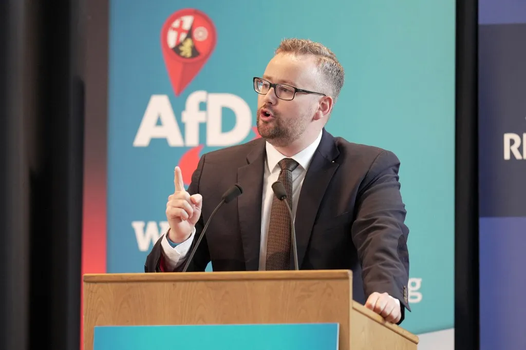 15 June 2024, Rhineland-Palatinate, Simmern: Sebastian Münzenmaier, deputy parliamentary group leader of the AfD in the Bundestag, is running for deputy state chairman of the Rhineland-Palatinate AfD at the state party conference. The agenda includes the election of a new state chairman. Photo: Thomas Frey/dpa (Photo by THOMAS FREY / DPA / dpa Picture-Alliance via AFP)