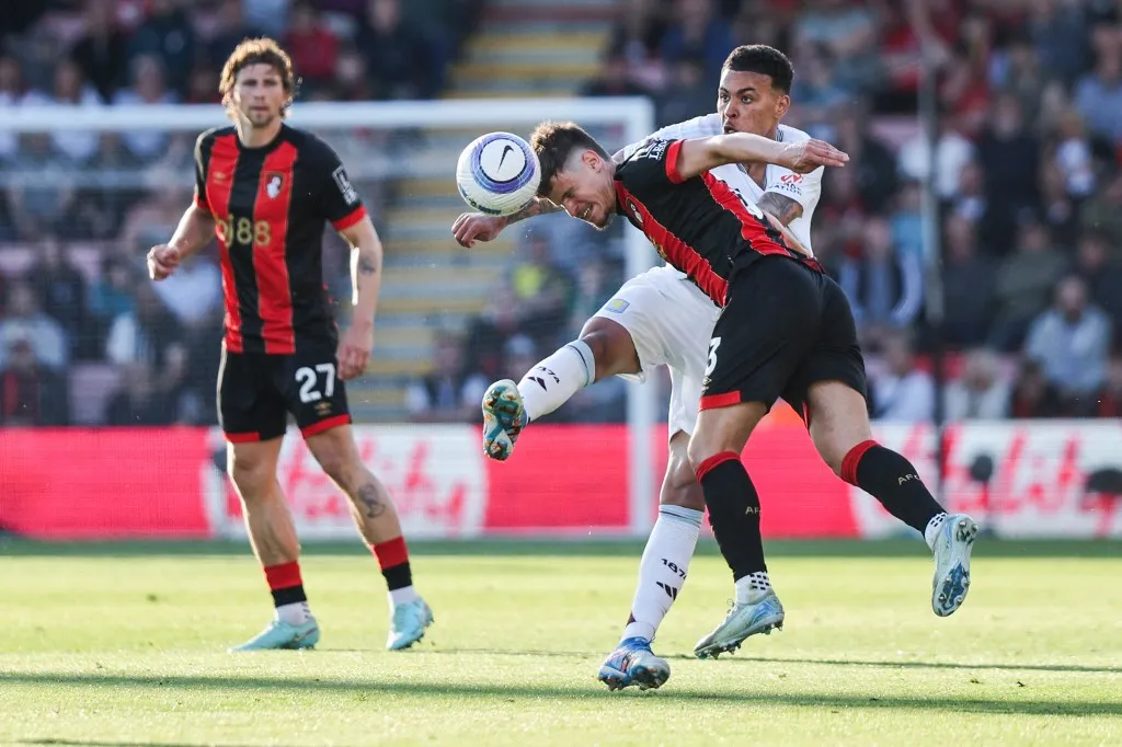 Aston Villa's English midfielder #27 Morgan Rogers (rear R) fights for the ball with Bournemouth's Hungarian defender #03 Milos Kerkez (front R) during the English Premier League football match between Bournemouth and Aston Villa at the Vitality Stadium in Bournemouth, southern England on May 10, 2025. (Photo by Adrian Dennis / AFP) / RESTRICTED TO EDITORIAL USE. No use with unauthorized audio, video, data, fixture lists, club/league logos or 'live' services. Online in-match use limited to 120 images. An additional 40 images may be used in extra time. No video emulation. Social media in-match use limited to 120 images. An additional 40 images may be used in extra time. No use in betting publications, games or single club/league/player publications. / 