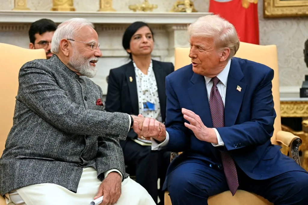 (FILES) US President Donald Trump shakes hands with Indian Prime Minister Narendra Modi in the Oval Office of the White House in Washington, DC, on February 13, 2025. President Trump on May 10, 2025, announced a ceasefire agreement between India and Pakistan following deadly attacks between the nuclear-armed rivals. "After a long night of talks mediated by the United States, I am pleased to announce that India and Pakistan have agreed to a FULL AND IMMEDIATE CEASEFIRE," Trump said on Truth Social, praising the two countries for "using Common Sense and Great Intelligence." (Photo by Jim WATSON / AFP)