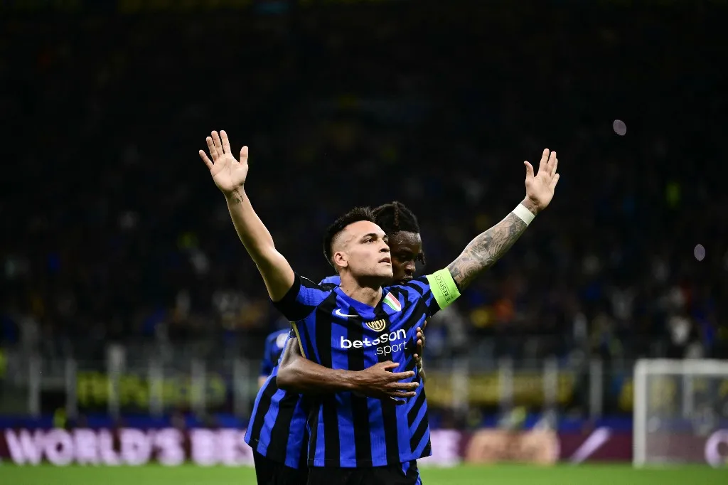 Inter Milan's Argentine forward #10 Lautaro Martinez celebrates scoring his team's first goal during the UEFA Champions League semi-final second leg football match between Inter Milan and FC Barcelona at the San Siro stadium in Milan on May 6, 2025. (Photo by Marco BERTORELLO / AFP)