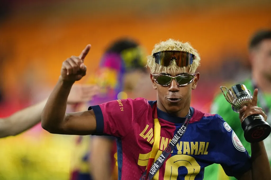 Lamine Yamal right winger of Barcelona and Spain celebrates the victory after winning the Copa del Rey Final match between FC Barcelona and Real Madrid at Estadio de La Cartuja on April 26, 2025 in Seville, Spain. (Photo by Jose Breton/Pics Action/NurPhoto) (Photo by Jose Breton / NurPhoto / NurPhoto via AFP)
