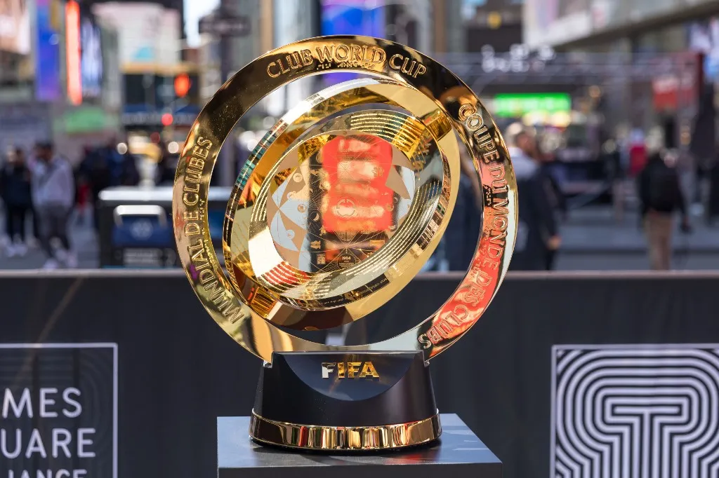 Tourists get chance to pose with trophies during the FIFA Club World Cup 2025 Activation at Times Square on May 20, 2025 in New York City. (Photo by William Volcov / BRAZIL PHOTO PRESS / Brazil Photo Press via AFP)