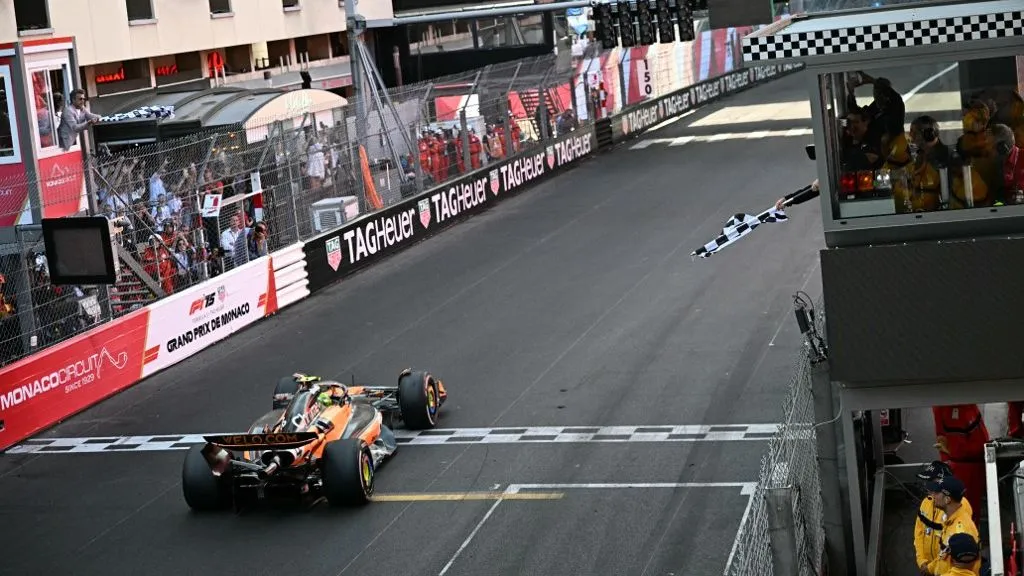 McLaren's British driver Lando Norris crosses the line to win the Formula One Monaco Grand Prix at the Circuit de Monaco, on May 25, 2025. (Photo by Gabriel BOUYS / AFP)