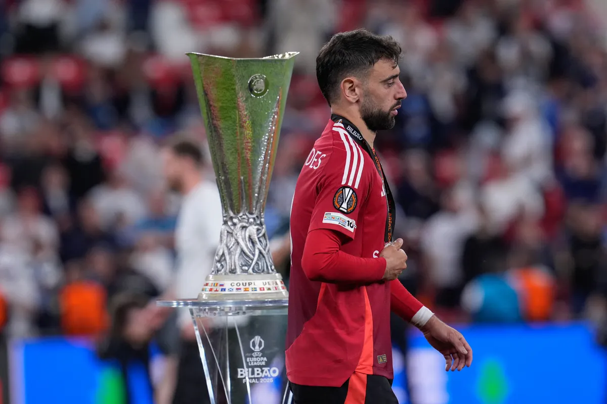 Bruno Fernandes of Manchester United passes near the trophy at the end of the UEFA Europa League Final match between Tottenham Hotspur and Manchester United at San Mames Stadium on May 21, 2025 in Bilbao, Spain. (Photo by Giuseppe Maffia/NurPhoto) (Photo by Giuseppe Maffia / NurPhoto / NurPhoto via AFP)