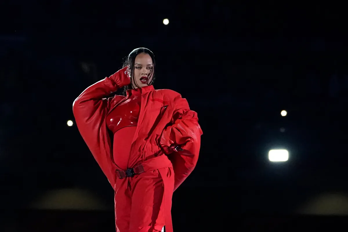 Barbadian singer Rihanna performs during the halftime show of Super Bowl LVII between the Kansas City Chiefs and the Philadelphia Eagles at State Farm Stadium in Glendale, Arizona, on February 12, 2023. (Photo by TIMOTHY A. CLARY / AFP)