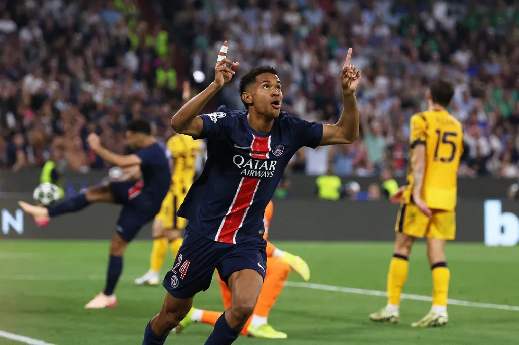 Paris Saint-Germain's French midfielder #24 Senny Mayulu celebrates after scoring PSG's fifth goal during the UEFA Champions League final football match between Paris Saint-Germain (PSG) and Inter Milan in Munich, southern Germany, on May 31, 2025. (Photo by FRANCK FIFE / AFP)