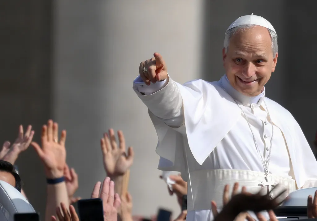 VATICAN CITY, VATICAN - MAY 18: Pope Leo XIV waves as he arrives in the Popemobile ahead of the Inauguration Mass of Pope Leo XIV in St Peter's Square on May 18, 2025 in Vatican City, Vatican. Pope Leo XIV (formerly Cardinal Robert Francis Prevost) presided over his inauguration mass in St Peter's Square after his election on May 8th. (Photo by David Ramos/Getty Images)