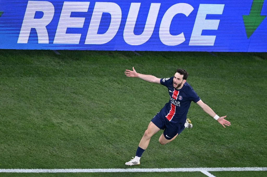 Paris Saint-Germain's Georgian forward #07 Khvicha Kvaratskhelia celebrates scoring his team's fourth goal during the UEFA Champions League final football match between Paris Saint-Germain (PSG) and Inter Milan in Munich, southern Germany on May 31, 2025. (Photo by Kirill KUDRYAVTSEV / AFP)