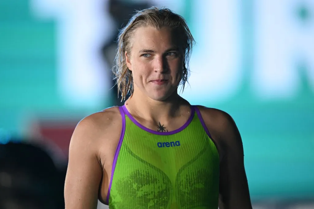 Lithuania's Ruta Meilutyte smiles after winning the final of the women's 50m breaststroke swimming event during the 2024 World Aquatics Championships at Aspire Dome in Doha on February 18, 2024. (Photo by Oli SCARFF / AFP)