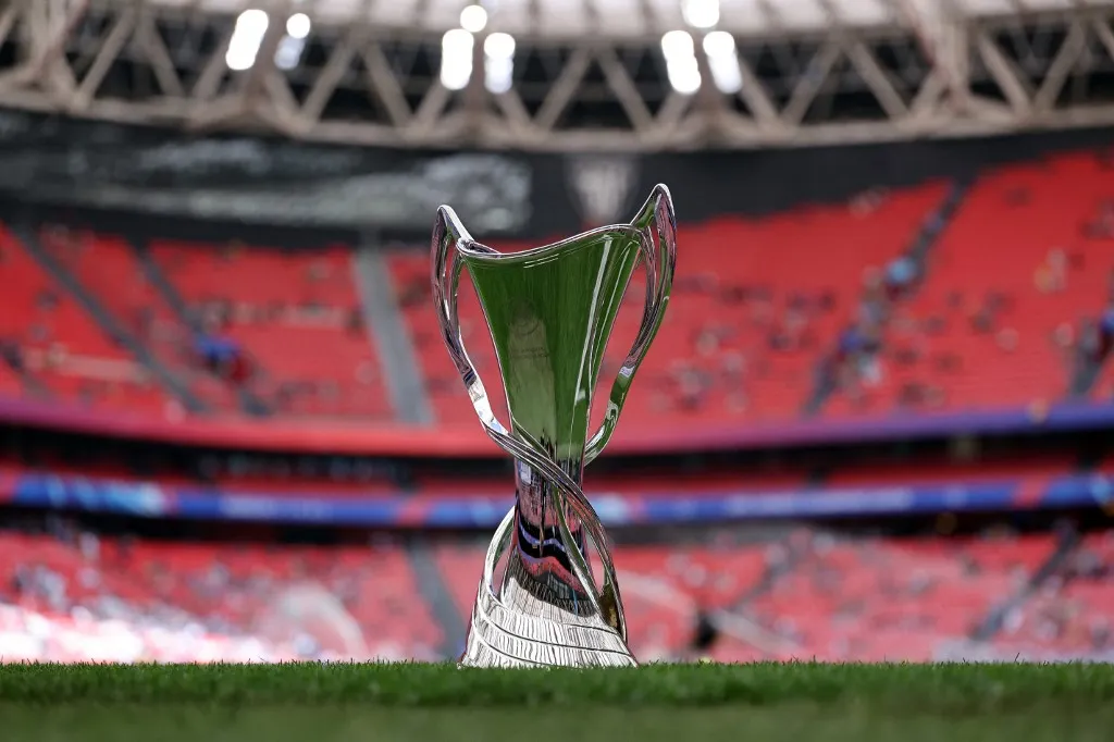 BL The championship's trophy is displayed on the pitch prior to the UEFA Women's Champions League final football match between FC Barcelona and  Olympique Lyonnais at the San Mames stadium in Bilbao on May 25, 2024. (Photo by Thomas COEX / AFP)