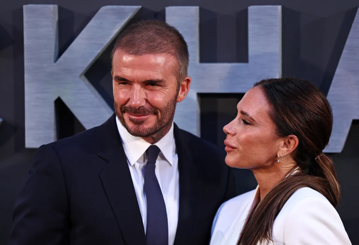Former England footballer David Beckham and his wife Victoria Beckham pose on the red carpet upon arrival to attend the Premiere of "Beckham" in London on October 3, 2023. (Photo by HENRY NICHOLLS / AFP)
