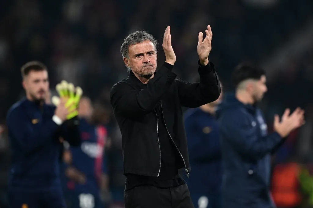 Paris Saint-Germain's Spanish headcoach Luis Enrique applauds the fans at the end of the UEFA Champions League semi-final second leg football match between Paris Saint-Germain (PSG) and Borussia Dortmund, at the Parc des Princes stadium in Paris on May 7, 2024. (Photo by MIGUEL MEDINA / AFP)