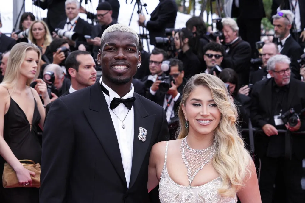 világbajnok Zulay Pogba and Paul Pogba  attend the ''Highest 2 Lowest'' red carpet during the 78th annual Cannes Film Festival at Palais des Festivals on May 19, 2025 in Cannes, France. (Photo by Daniele CIfala/NurPhoto) (Photo by Daniele Cifalà / NurPhoto via AFP)