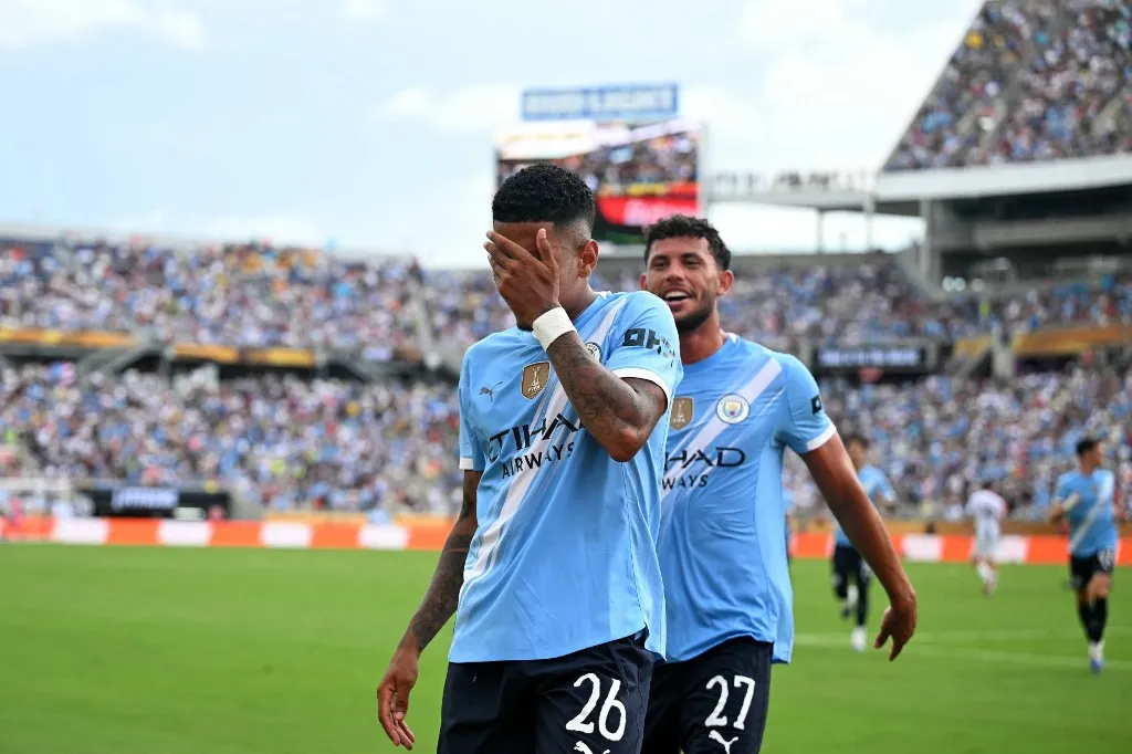 Manchester City's Brazilian midfielder #26 Savinho celebrates scoring his team's fifth goal during the FIFA Club World Cup 2025 Group D football match between Italy's Juventus and England's Manchester City at the Camping World stadium in Orlando on June 26, 2025. (Photo by Chandan KHANNA / AFP)