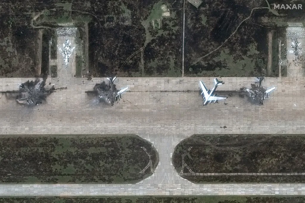 This handout satellite picture courtesy of Maxar Technologies released on June 4, 2025 shows  destroyed Tupolev Tu-95 aicrafts at Belaya Airbase near Usolye-Sibirskoye in the Irkutsk Oblast. Ukraine said on June 1, 2025 it destroyed Russian bombers worth billions of dollars as far away as Siberia, in its longest-range assault of the war as it geared up for talks on prospects for a ceasefire. (Photo by Satellite image ©2025 Maxar Technologies / AFP) / RESTRICTED TO EDITORIAL USE - MANDATORY CREDIT "AFP PHOTO /  Satellite image ©2025 Maxar Technologies. - NO MARKETING NO ADVERTISING CAMPAIGNS - DISTRIBUTED AS A SERVICE TO CLIENTS