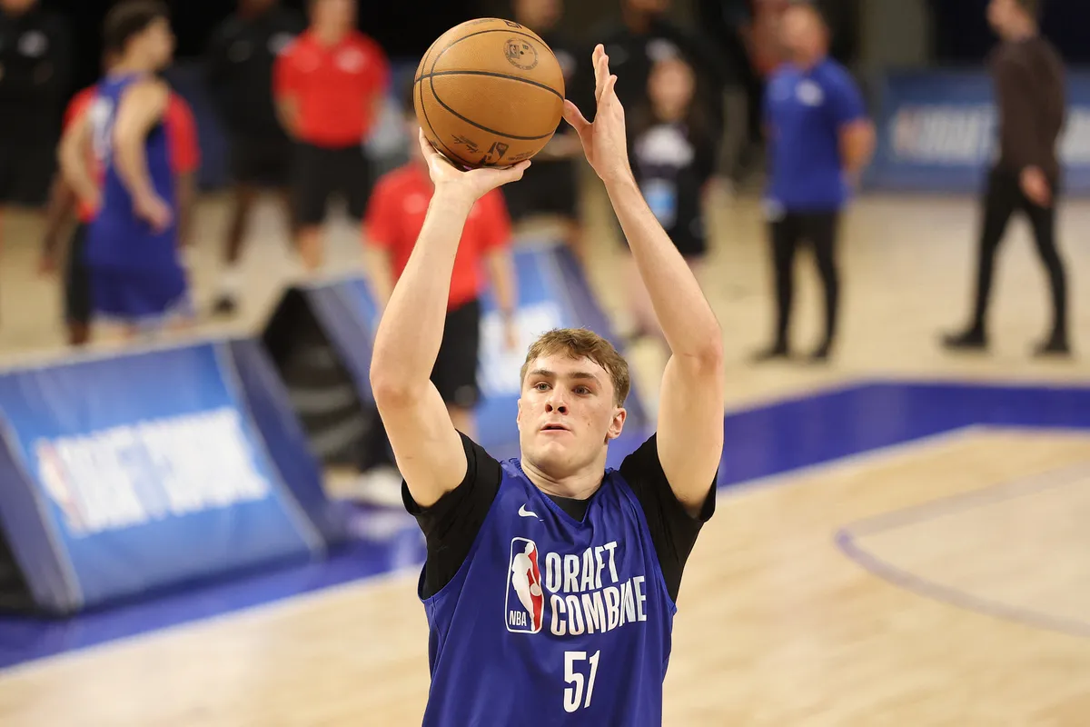 CHICAGO, ILLINOIS - MAY 13: Cooper Flagg #51 takes part in a shooting drill during the 2025 NBA Draft Combine at Wintrust Arena on May 13, 2025 in Chicago, Illinois. Michael Reaves/Getty Images/AFP (Photo by Michael Reaves / GETTY IMAGES NORTH AMERICA / Getty Images via AFP)