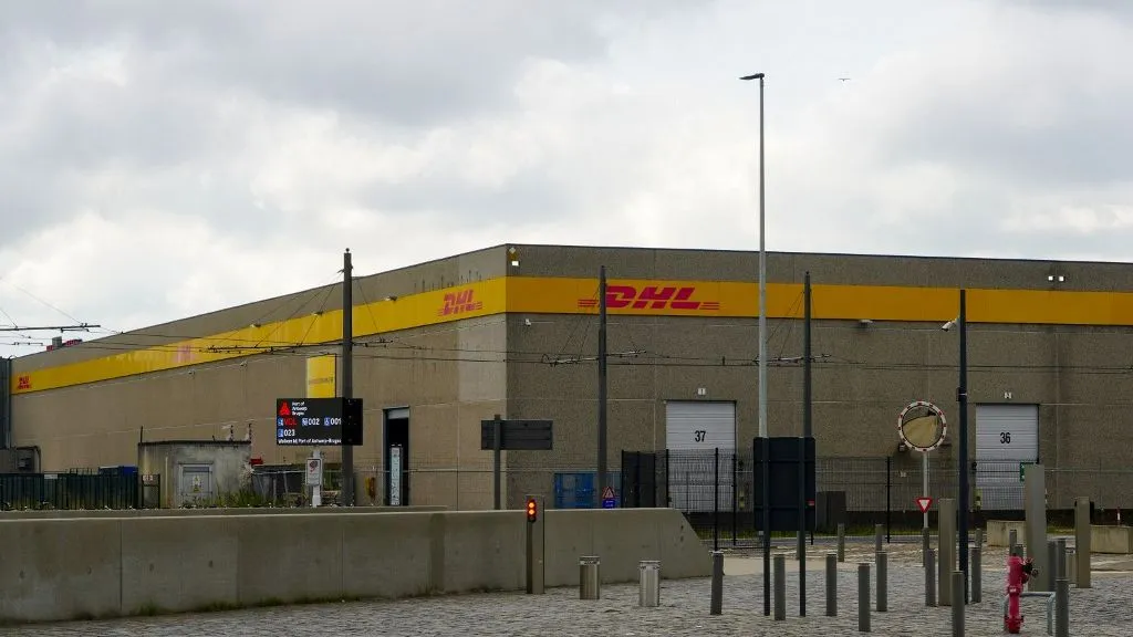 A DHL Freight logistics center with delivery bays and infrastructure is at the Port of Antwerp in Antwerp, Belgium, on August 1, 2023. The facility serves as a hub for road-based cargo transport and logistics operations within the region. (Photo by Michael Nguyen/NurPhoto) (Photo by Michael Nguyen / NurPhoto via AFP)