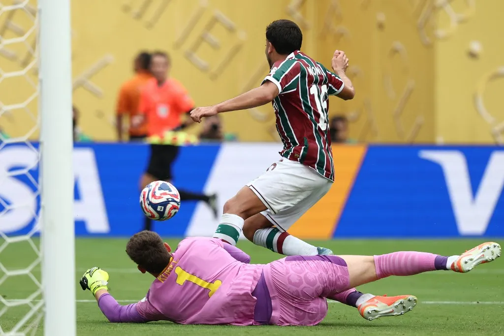 Borussia Dortmund's Swiss goalkeeper #01 Gregor Kobel (L) makes a save in front of Fluminense's Brazilian midfielder #16 Nonato during the FIFA Club World Cup 2025 Group F football match between Brazil's Fluminense and Germany's Borussia Dortmund at the MetLife stadium in East Rutherford, New Jersey on June 17, 2025. (Photo by FRANCK FIFE / AFP)