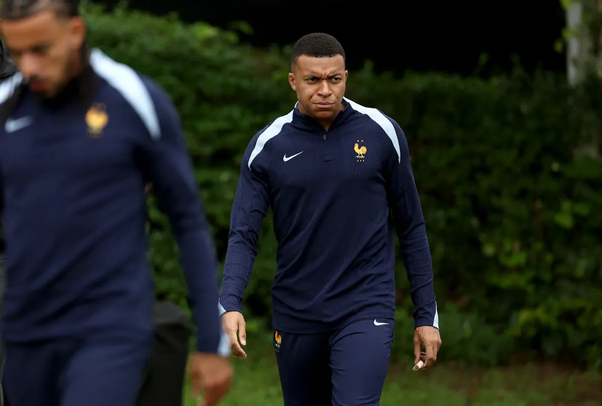 France's forward #10 Kylian Mbappé arrives for a training session of France's national football team in Bietigheim near Stuttgart, southwestern Germany on June 7, 2025, ahead of the UEFA Nations League third place play-off football match between Germany and France on June 8. (Photo by FRANCK FIFE / AFP)