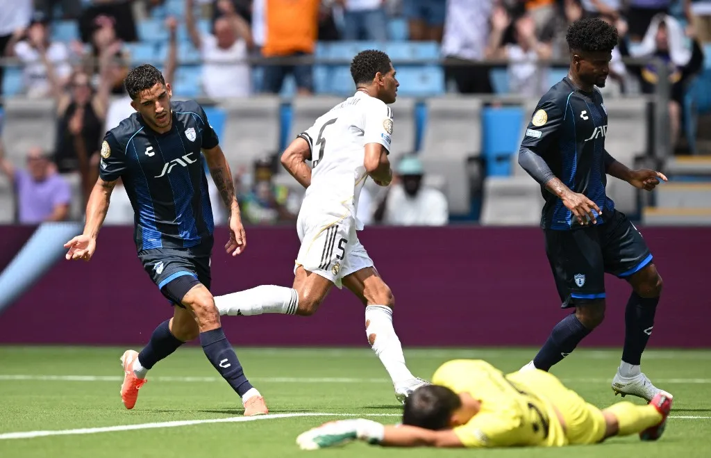 Real Madrid's English midfielder #05 Jude Bellingham celebrates after scoring the opening goal during the FIFA Club World Cup 2025 Group H football match between Spain's Real Madrid and Mexico's Pachuca at the Bank of America stadium in Charlotte on June 22, 2025. (Photo by Federico PARRA / AFP)